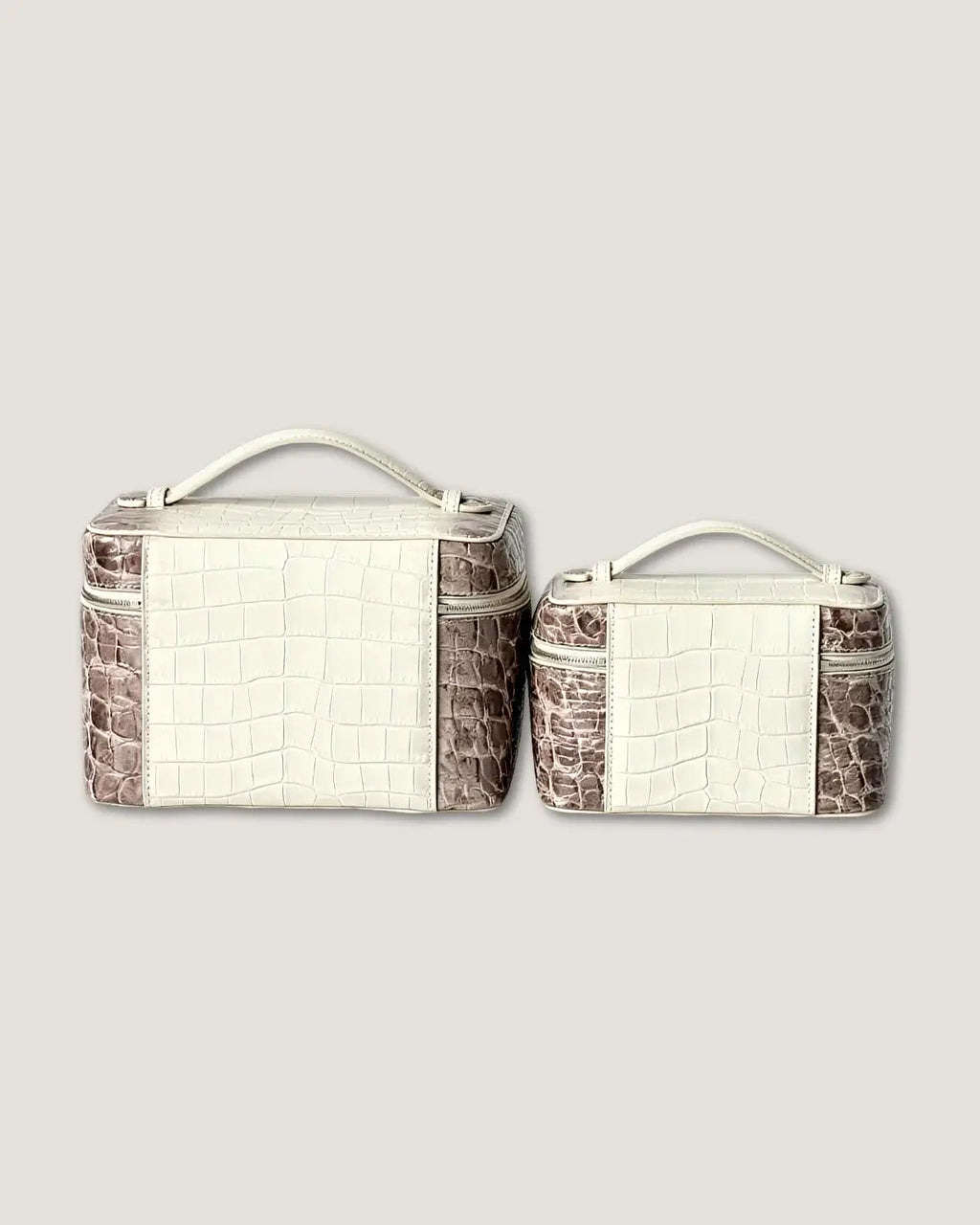 large leather train case set in crocodile texture, featuring premium top-grain cowhide and inner velvet pockets.