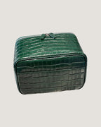 Medium train case leather in glossy green croc pattern with zip closure, perfect for travel and organization.