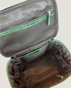 Medium train case leather interior view showing zippered and open pockets for organized storage.