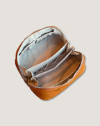 Inside view of LayFlat Vanity Bag showcasing multiple pockets and water-resistant lining.