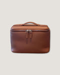 Medium leather vanity bag in rich brown full grain leather with zip closure and flat top handle.